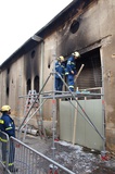 Einsatz: TZ - Gebäudesicherung nach Lagerhallenbrand - Friedberg